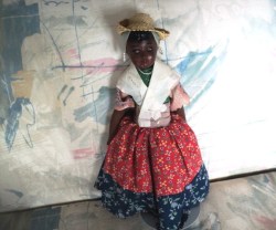 15''HAITI ISLAND DOLL BROWN CLOTH BODY CHINA FACE HAT PRINT DRESS